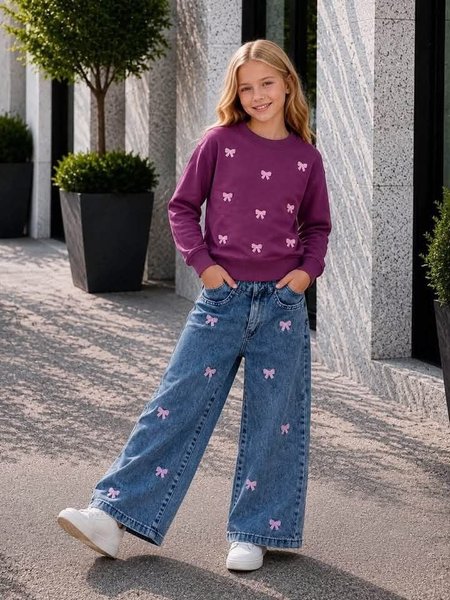 Komplet dziewczęcy – Fioletowa bluza i dżinsy Wide Leg w kokardki